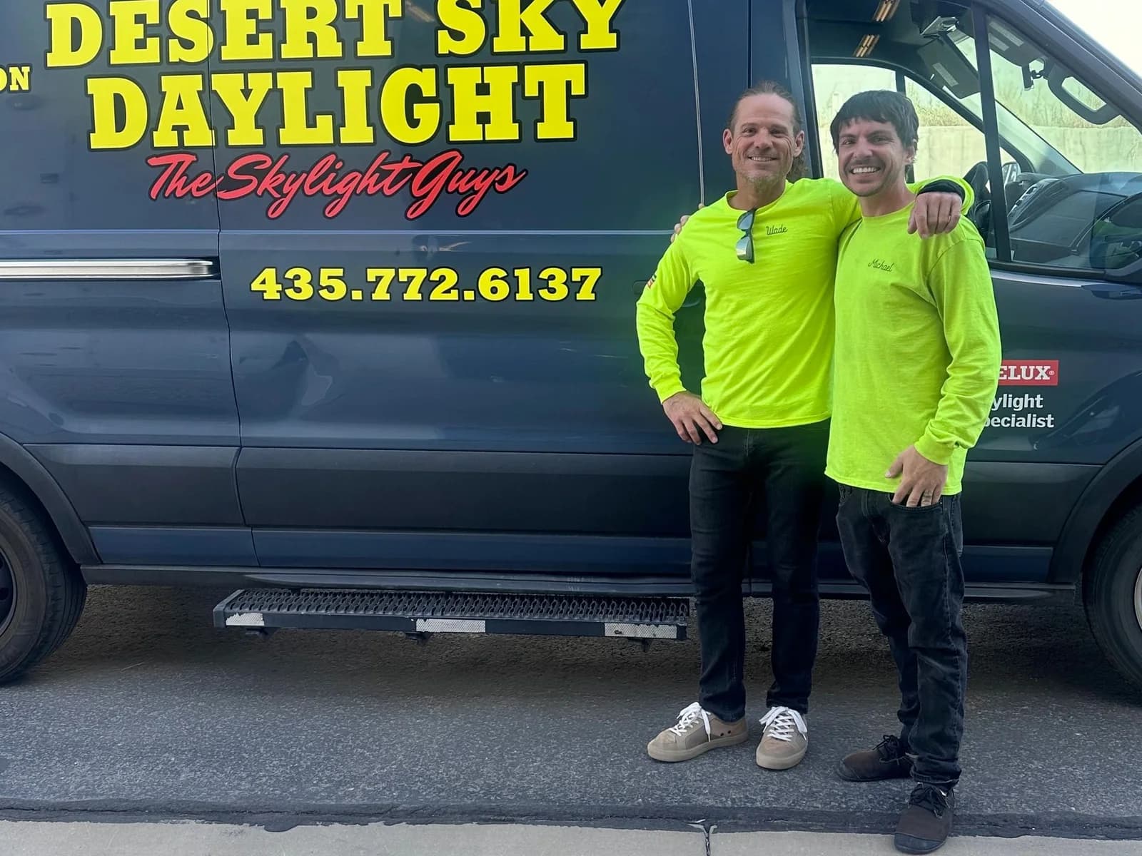 Wade Knight and Michael Wall together beside the Desert Sky Daylight van